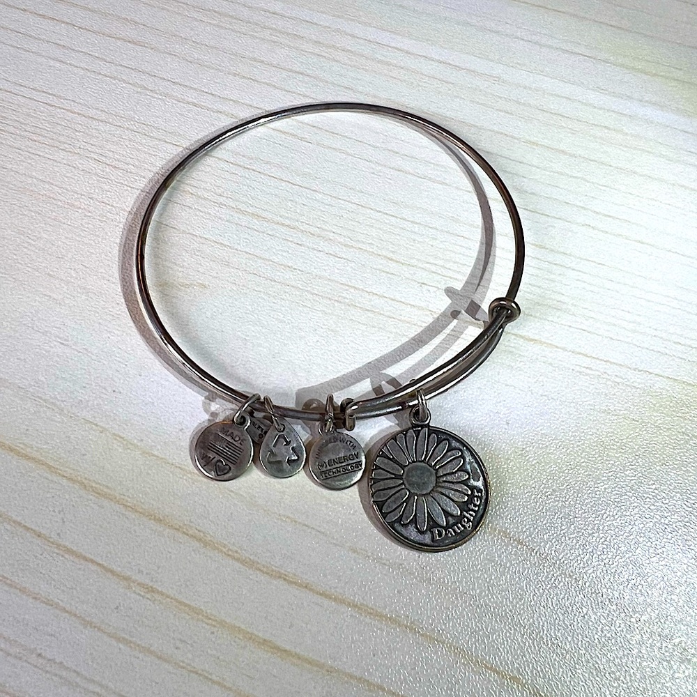 Used Alex and Ani daughter charm bracelet made in 2013